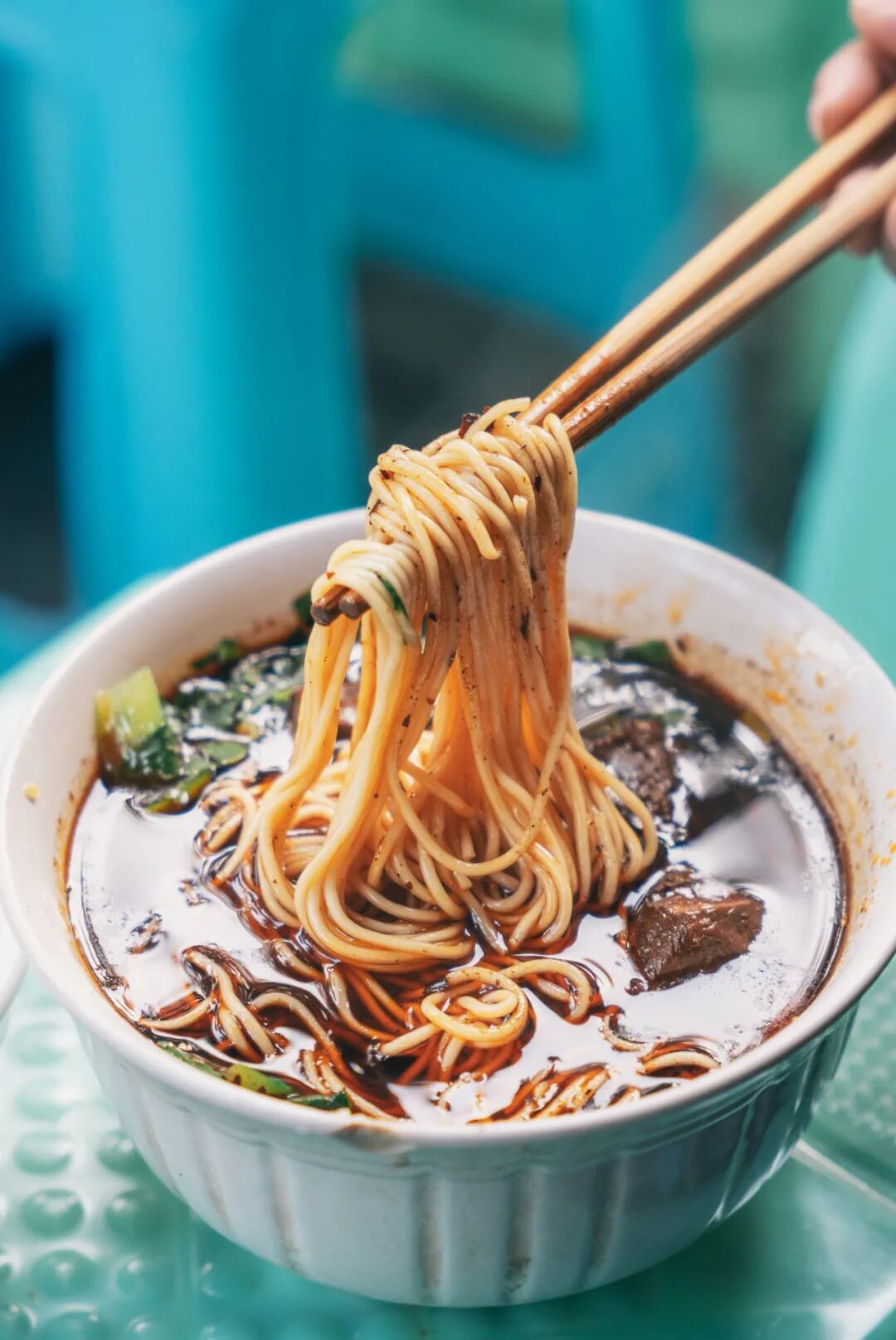 Why can a single bowl of Xiaomian represent Chongqing?