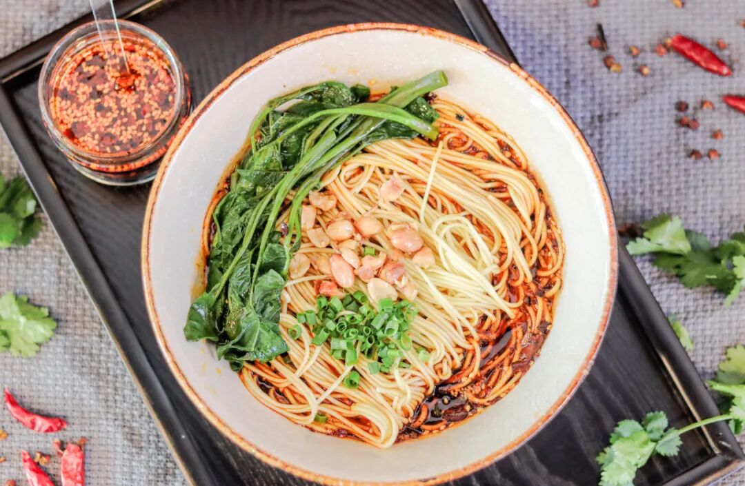 Image related to Why can a single bowl of Xiaomian represent Chongqing?