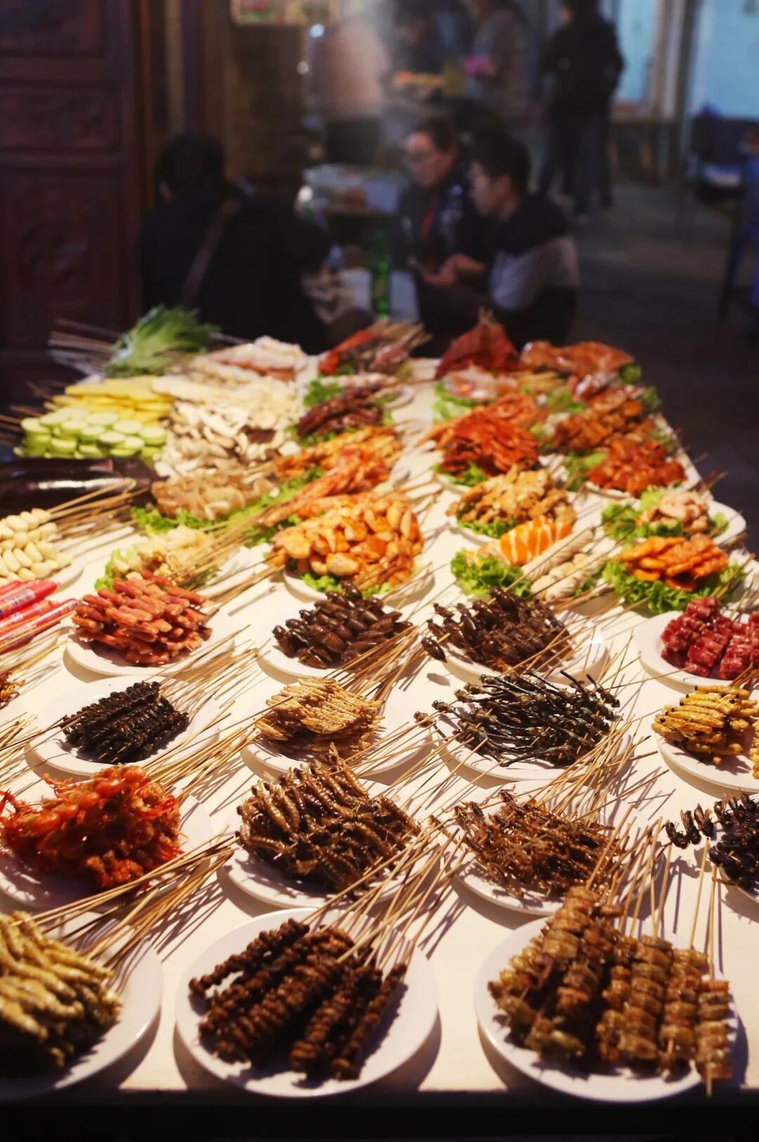 Image related to China's Wildest BBQ Province: Whole Pigs, Mushrooms, Even Insects—Nothing's Off the Grill!